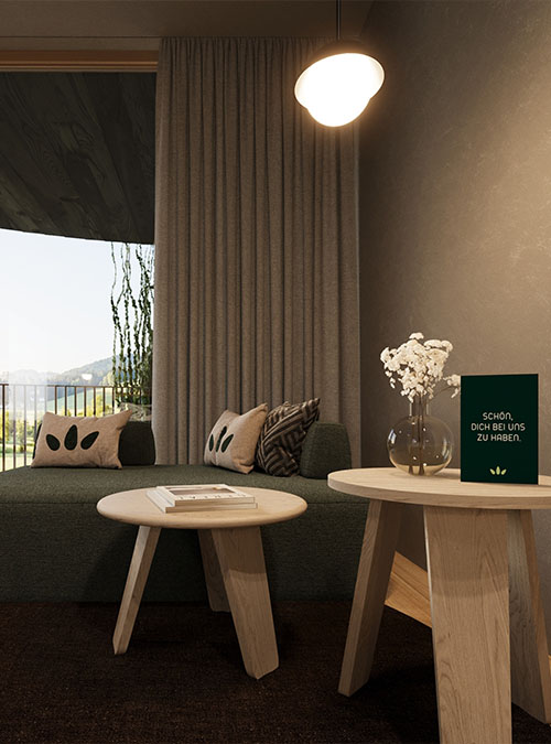 Gemütliche Sitzecke im Einzelzimmer mit Abendlicht