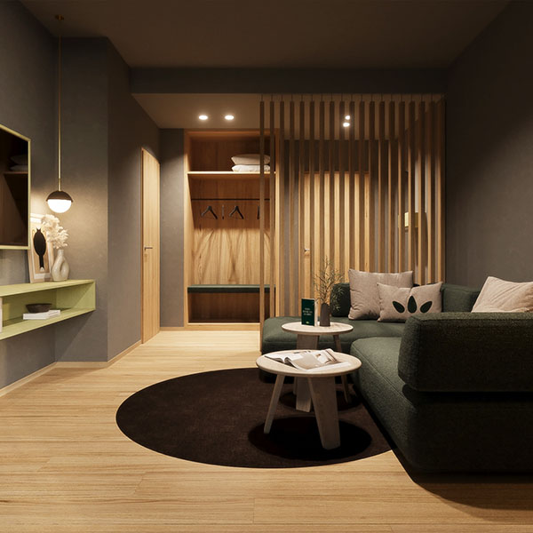 Wohnbereich mit Sofa, Couchtisch und offenem Kleiderschrank